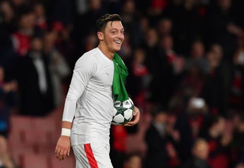 M. Ozil scored his first career hat-trick