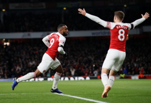 A. Lacazette's goal extends Arsenal's unbeaten streak in a duel with Liverpool