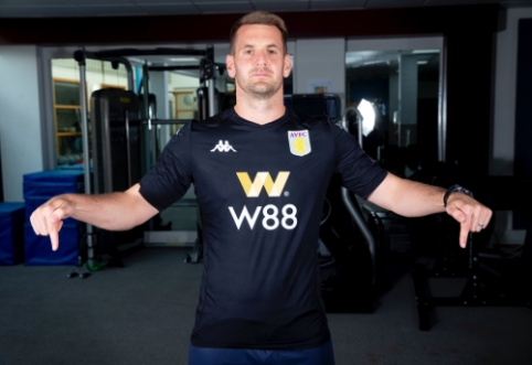 "Aston Villa" cross hands with "Burnley" goalkeeper.