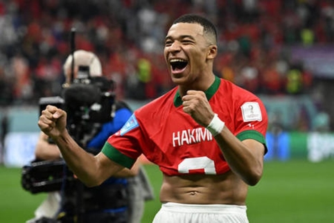 After winning the match K. Mbappe put on Morocco shirts