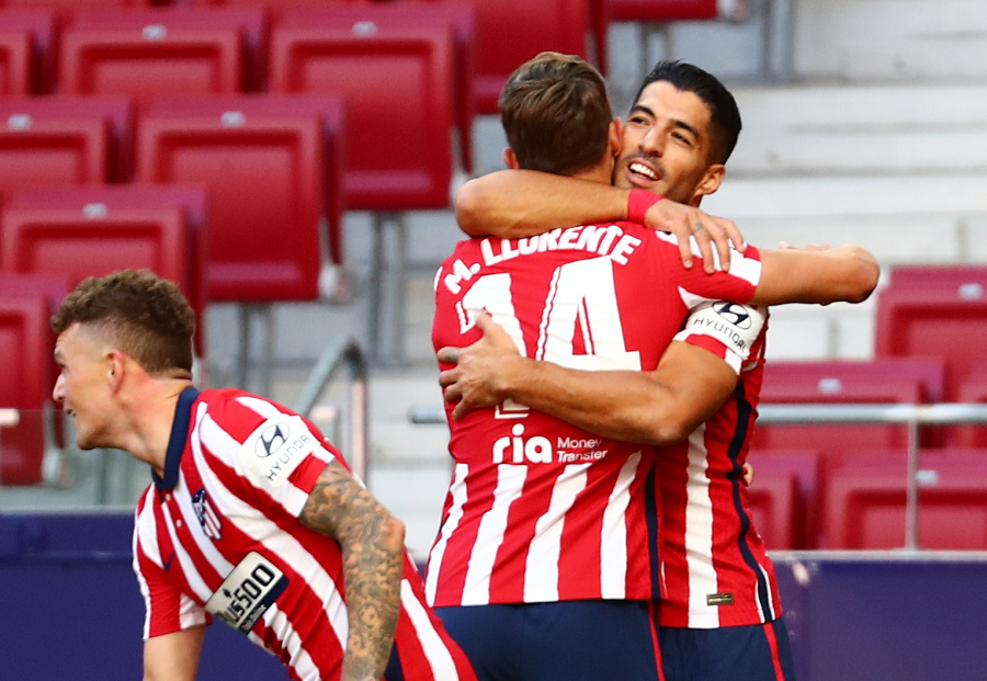 L. Suarez marked his debut in Atletico with two goals and an assist