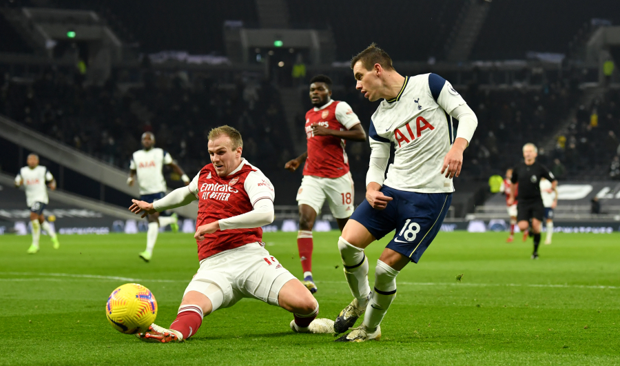 "Tottenham" dealt with "Arsenal" in the first half