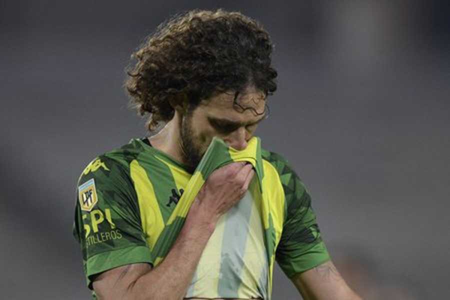 F. Coloccini's dressing room football boots on the vine