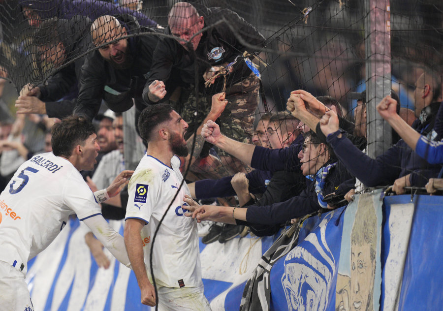 The Marseille team celebrated a victory in the "Olympique" derby