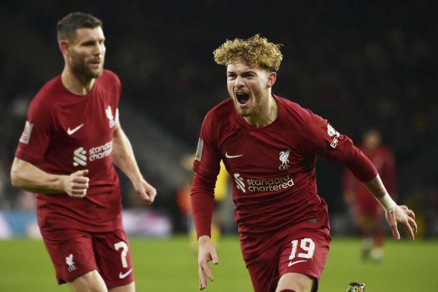 FA Trophy: "Liverpool" defeats "Wolves" football players.