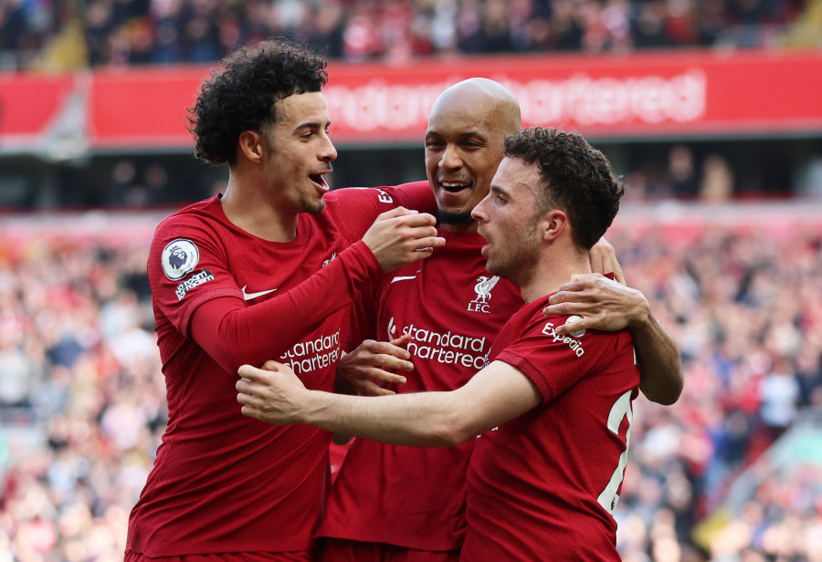 Liverpool" defeated "Forest" team players after a tough fight.